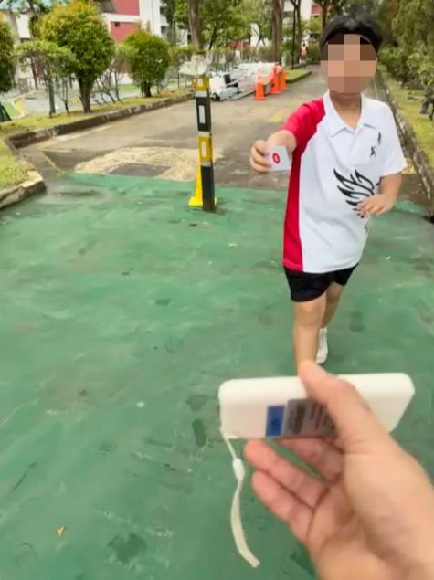 Students running laps with rfid cards and passing by a rfid reader