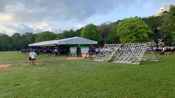 Secondary school participants gathered at an obstacle station during BB Blaze 2026, a large-scale adventure race held across Eastern Singapore.